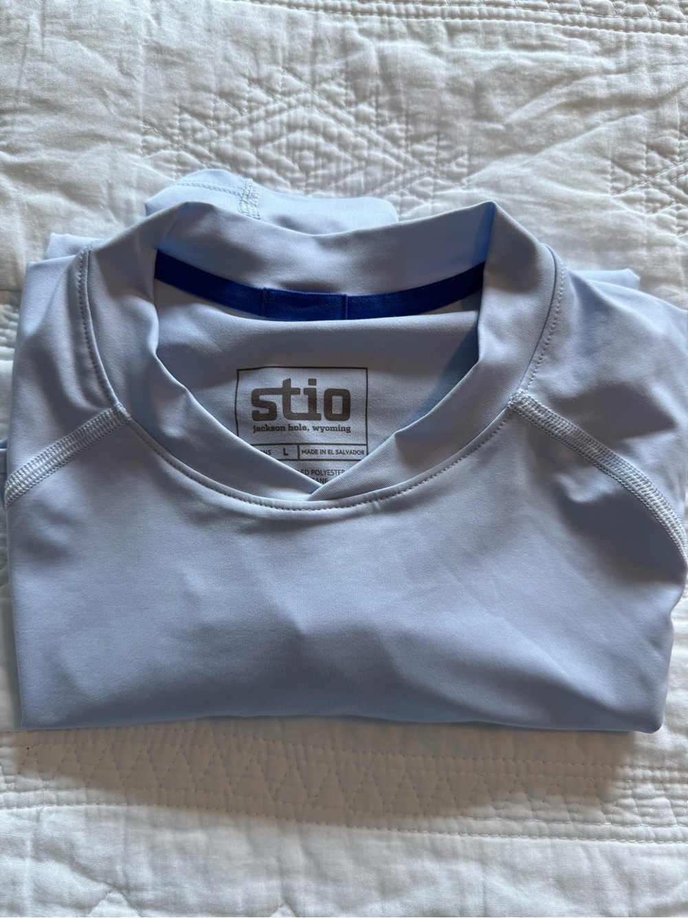 NWOT: never wornStio Light Blue Long-Sleeve Performance Tee with Blue Logo
